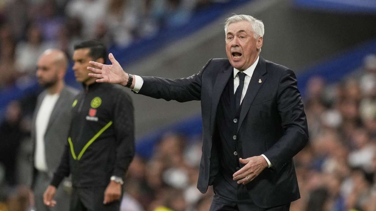 Real Madrid's head coach Carlo Ancelotti reacts during the Spanish La Liga soccer match between Real Madrid and Celta Vigo at the Santiago Bernabeu stadium in Madrid, Spain, Sunday, May 4, 2025.