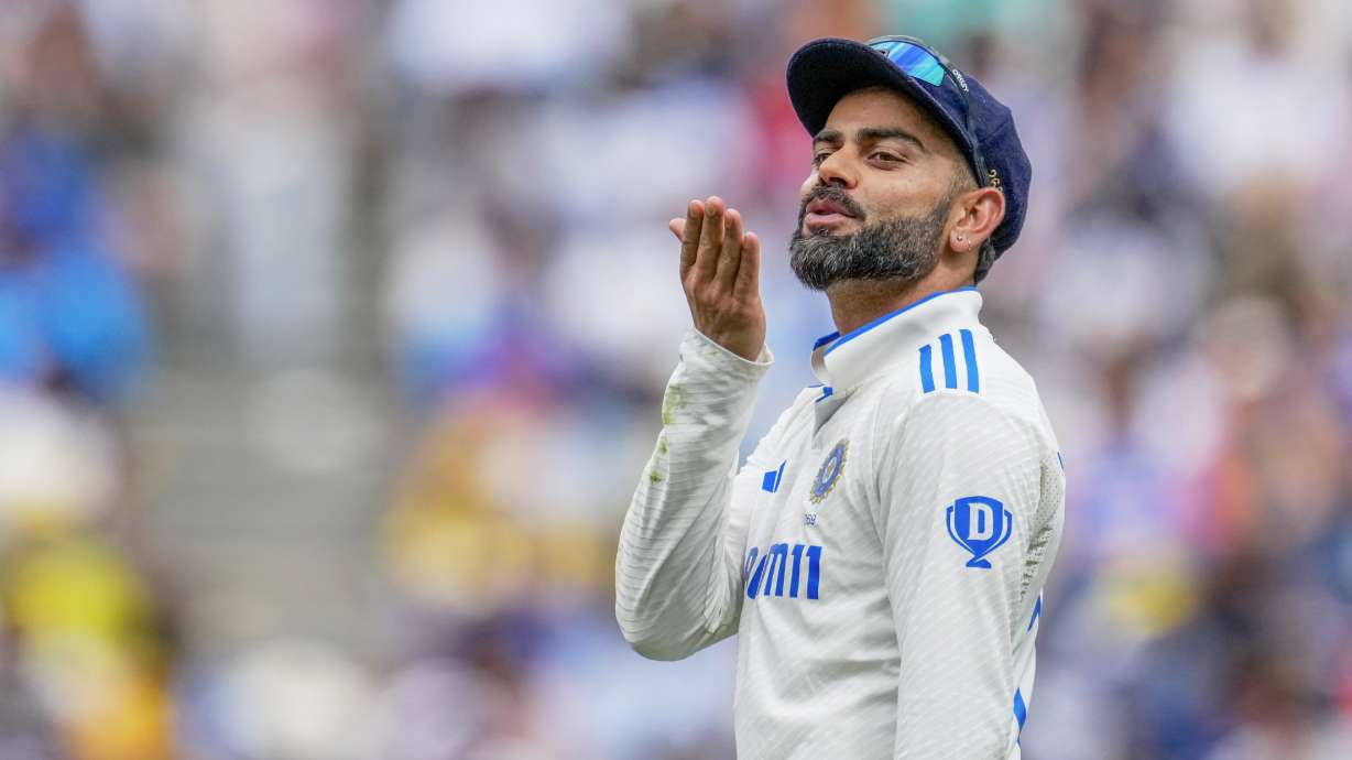 FILE - India's Virat Kohli gestures to a member of a crowd during play on the first day of the fourth cricket test between Australia and India at the Melbourne Cricket Ground, Melbourne, Australia, on Dec. 26, 2024.
