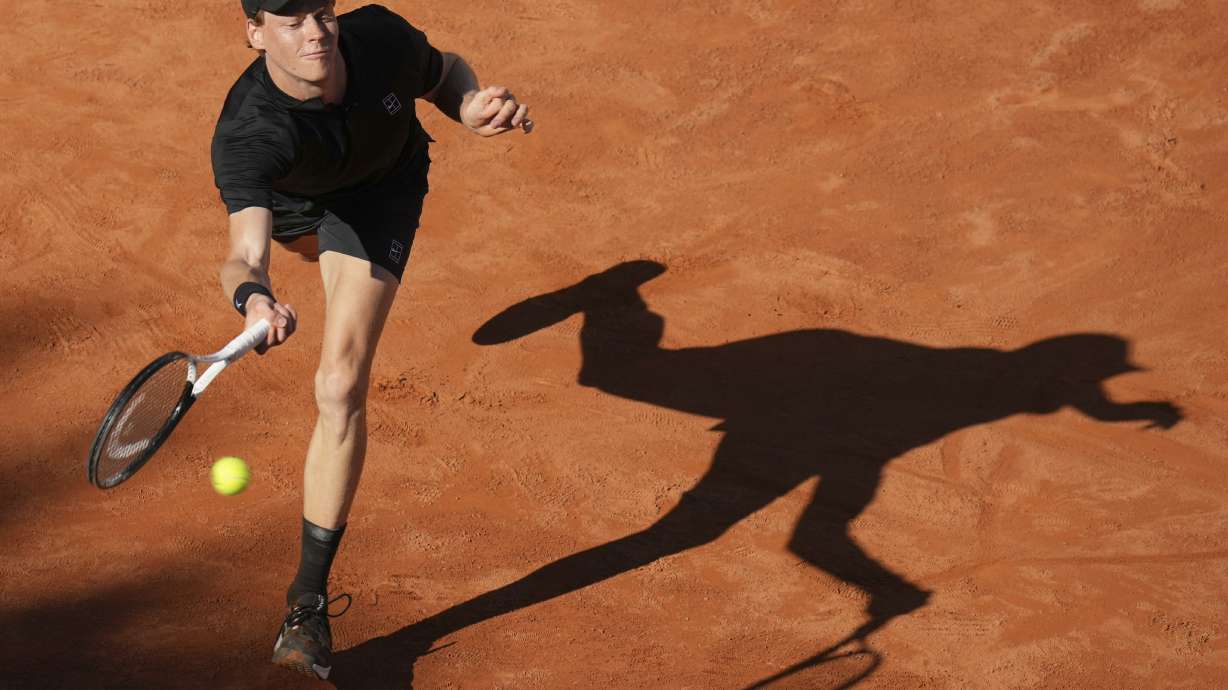 Italy's Jannik Sinner returns the ball to Netherlands' Jesper De Jong during their tennis match at the Italian Open at the Foro Italico, in Rome, Monday, May 12, 2025.