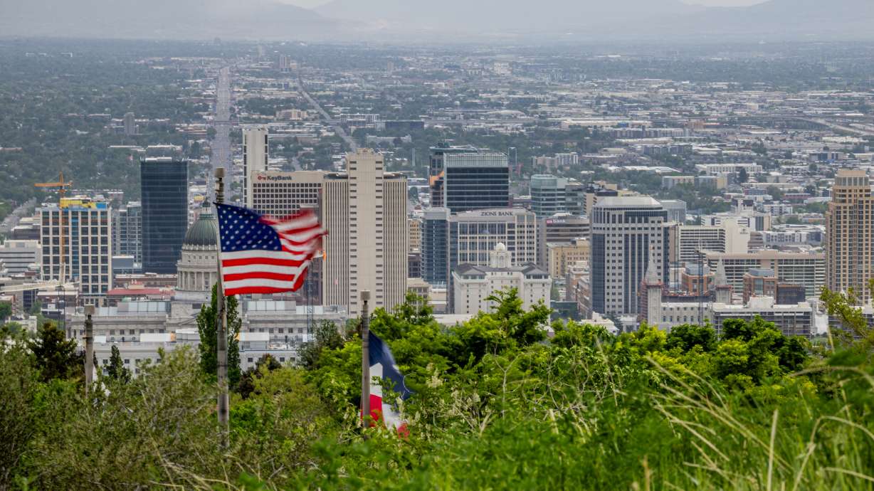 Wind blows at Ensign Peak in Salt Lake City on Sunday. Potentially damaging winds are expected to continue on Monday ahead of the next storm system slated to impact the state.