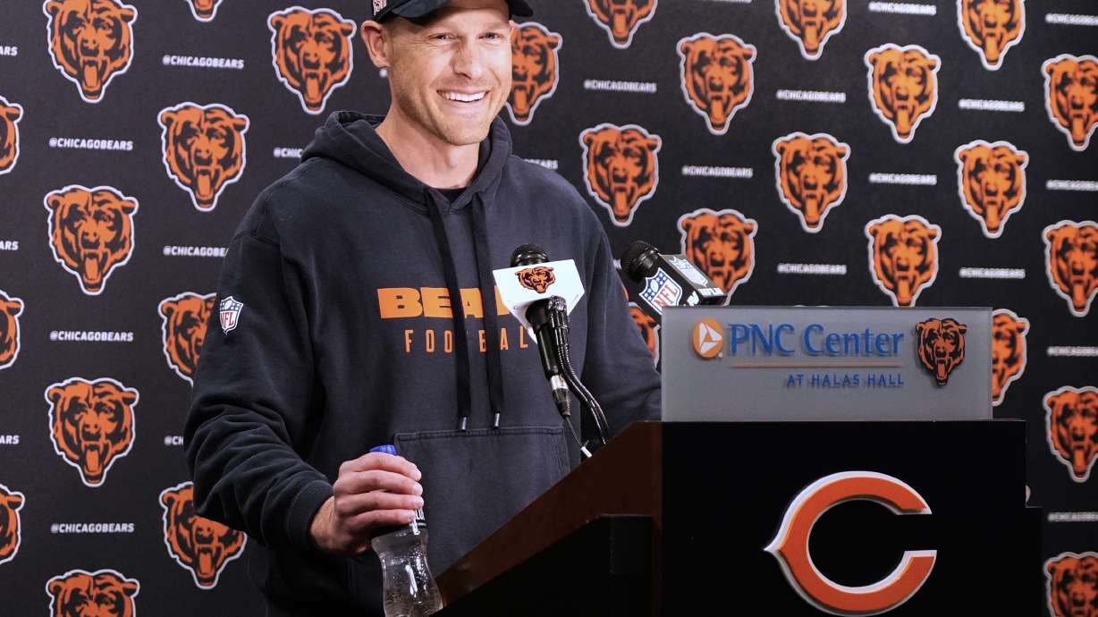 Chicago Bears new head coach Ben Johnson smiles as he talks to media members after the NFL football team's rookie camp in Lake Forest, Ill., Friday, May 9, 2025.