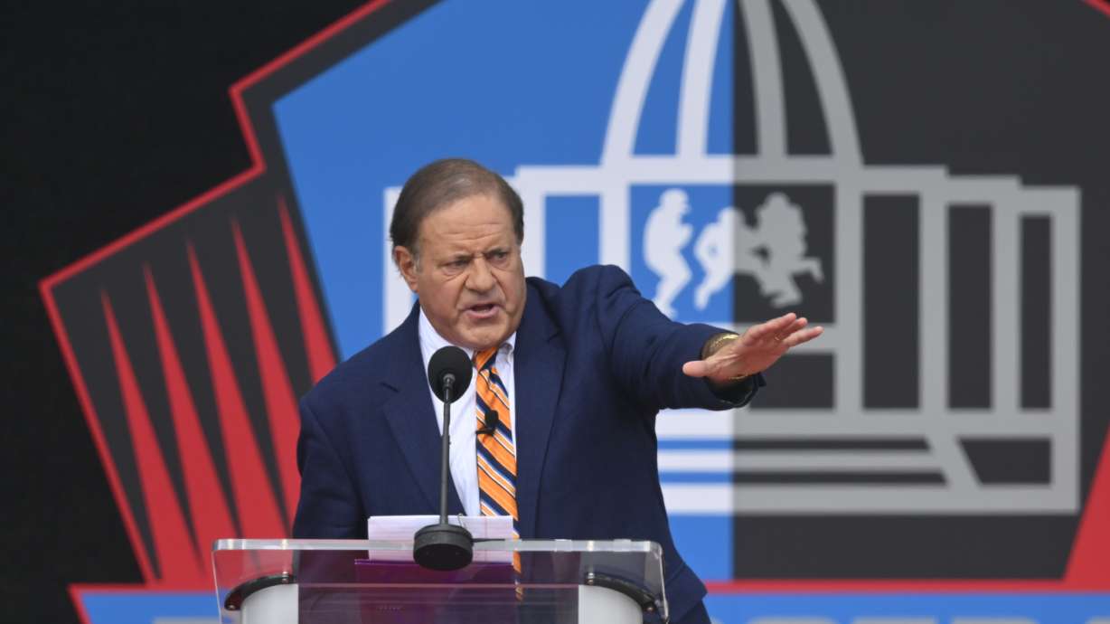 FILE - ESPN broadcaster Chris Berman hosts an induction ceremony at the Pro Football Hall of Fame, Aug. 3, 2024, in Canton, Ohio.