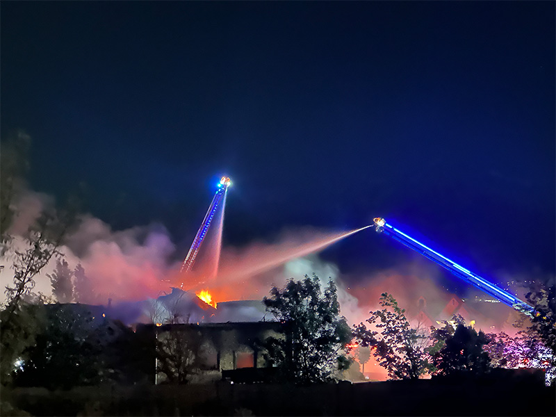 A garage fire in Bluffdale spread through a home, forcing residents to be displaced early Monday.
