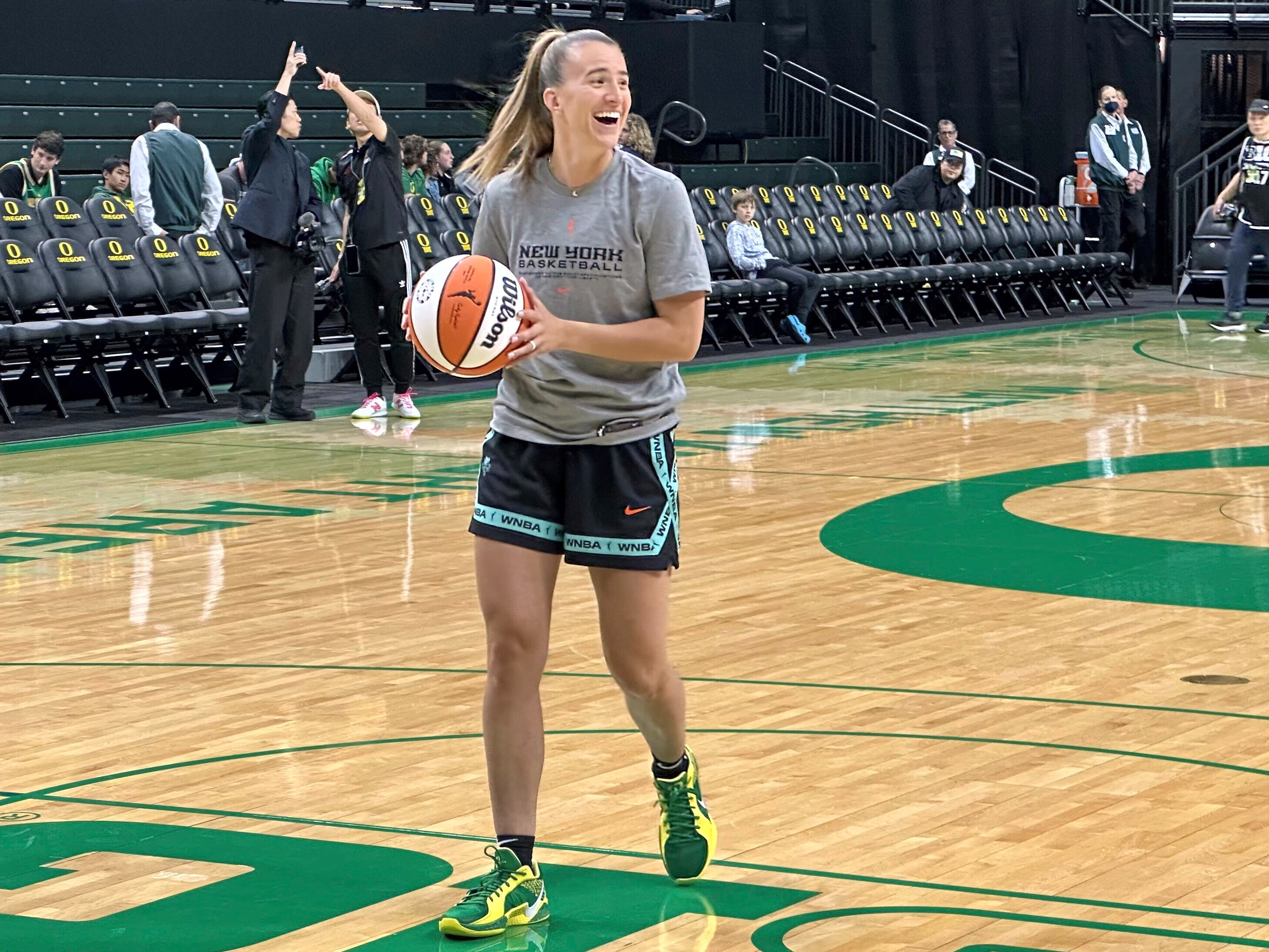 New York Liberty guard Sabrina Ionescu laughs during warmups before a preseason WNBA basketball game against the Toyota Antelopes, of Japan, in Eugene, Oregon, Monday, May 12, 2025. .