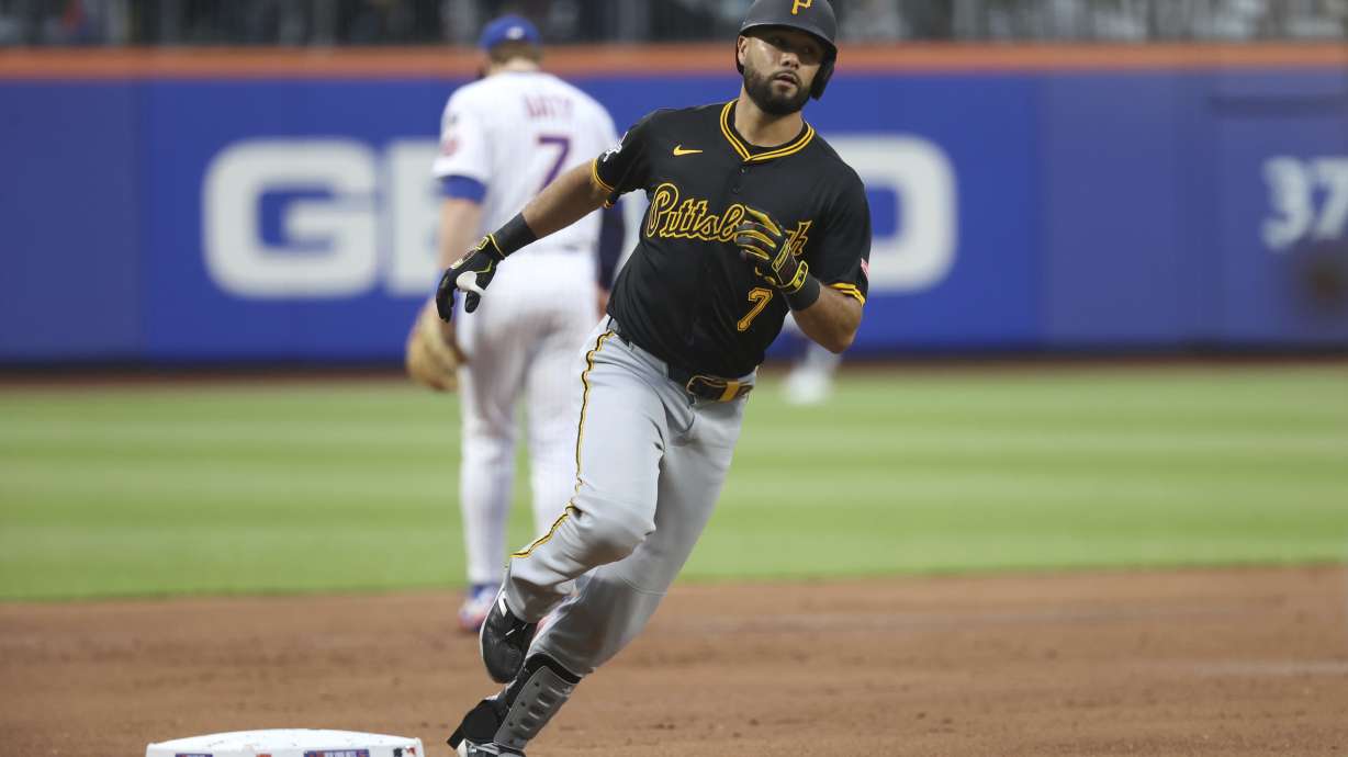 Pittsburgh Pirates' Isiah Kiner-Falefa runs to home plate after hitting a home run during the second inning of a baseball game against the New York Mets, Monday, May 12, 2025, in New York.