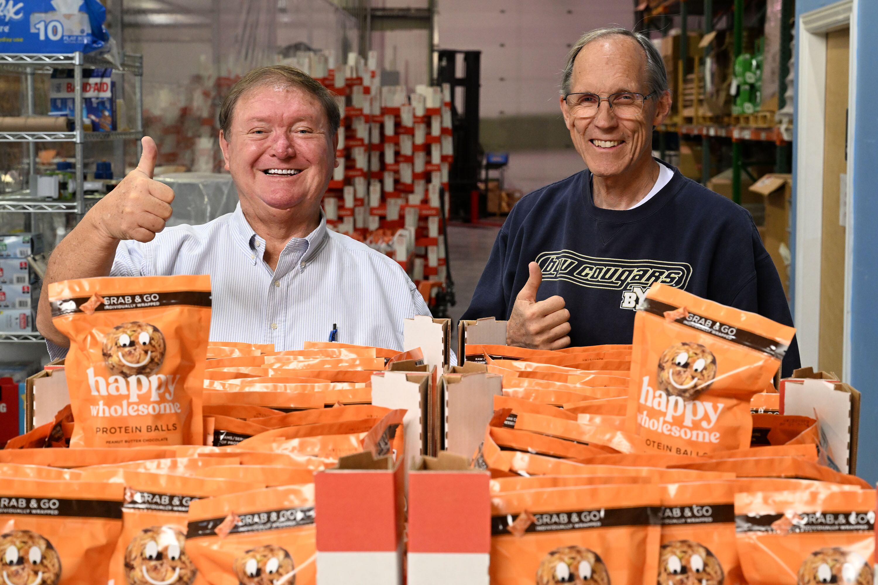 Stephen Story and Jarakae Jensen pose for a photo at Modballs in Pleasant Grove on April 28. A protein snack made it from a kitchen in Highland to some Costco stores along the Wasatch Front.