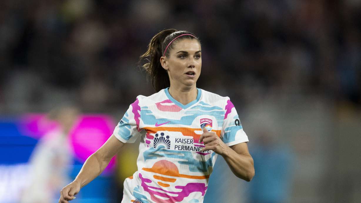 FILE - San Diego Wave forward Alex Morgan (13) runs during an NWSL soccer match against Seattle Reign, March 29, 2024, in San Diego.