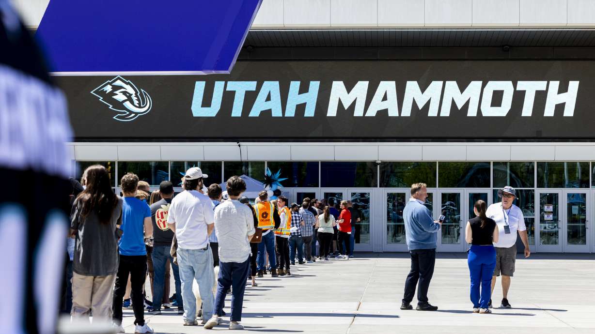 People wait in line to shop in the team store after a press conference announcing the Utah Hockey Club is changing their name to Utah Mammoth held at the Delta Center in Salt Lake City on Wednesday, May 7, 2025.