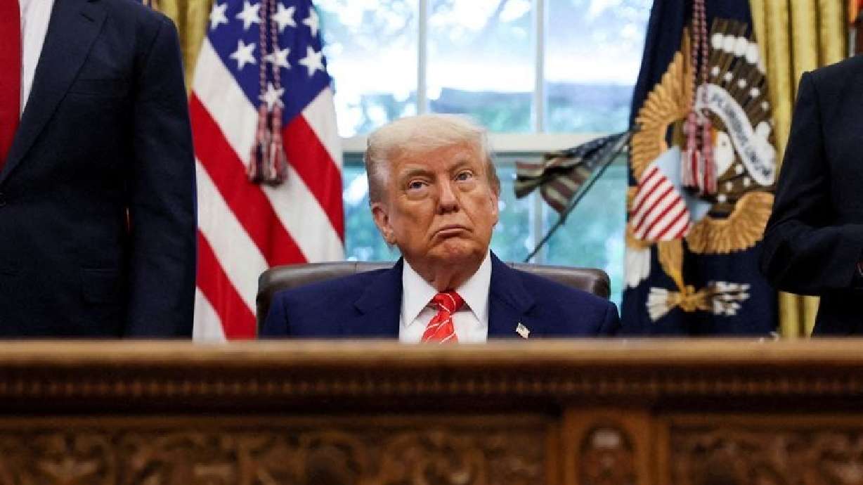 President Donald Trump speaks in the Oval Office at the White House in Washington, May 8. A coalition of 29 states filed two lawsuits on Tuesday related to immigration enforcement.