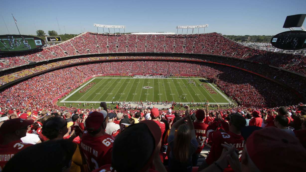 FILE - Fans watch an NFL football game between the Kansas City Chiefs and the New York Giants at Arrowhead Stadium, Sept. 29, 2013, in Kansas City, Mo.
