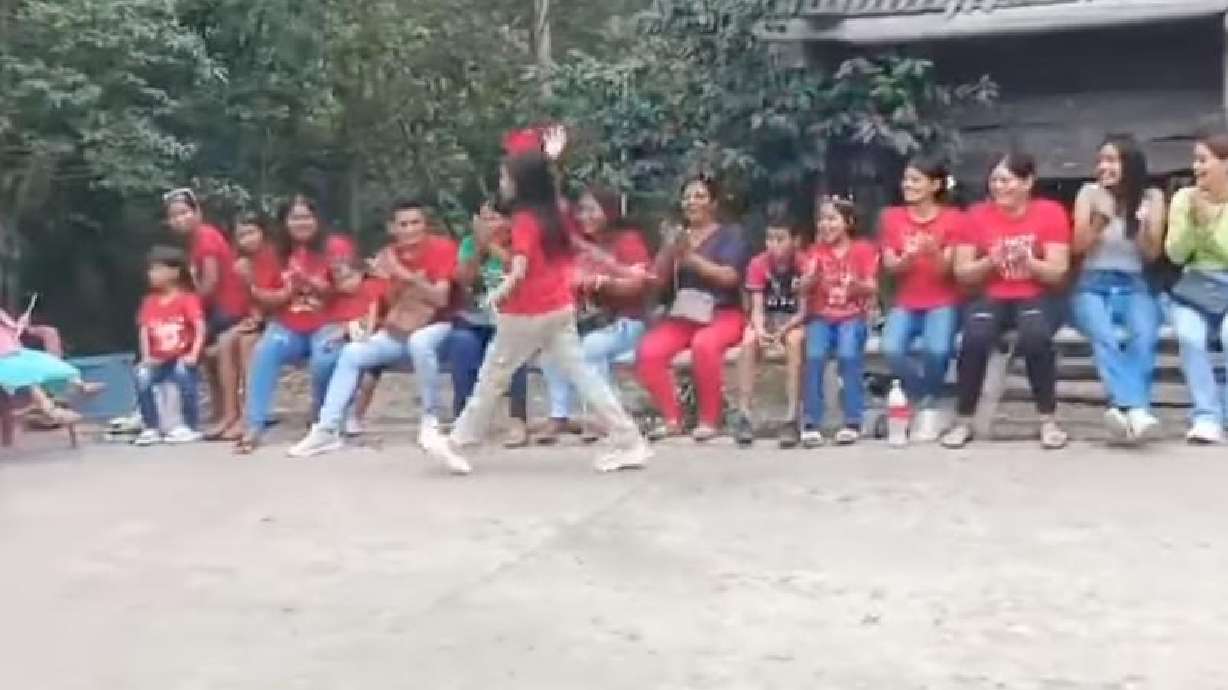A bench loaded with people collapses as a girl unabashedly continues to seek praise in this April 24 video from Esmereldas, Ecuador.