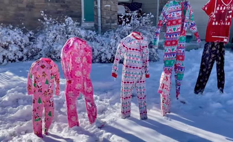 A family of frozen pajamas stands in this Berthoud, Colorado, yard Dec. 22, 2022.