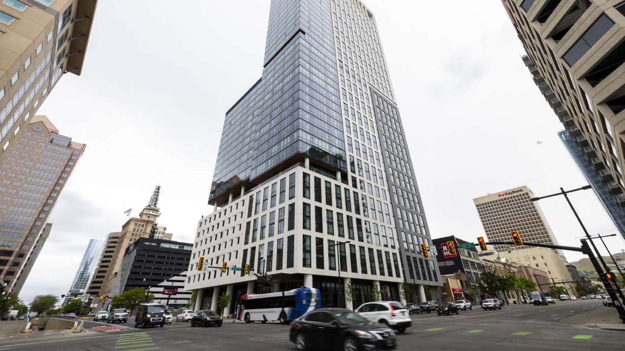 Traffic drives past the Astra Tower in Salt Lake City on Tuesday. Utah's capital city led the state in numeric from 2023 to 2024, according to Census Bureau data released on Thursday.