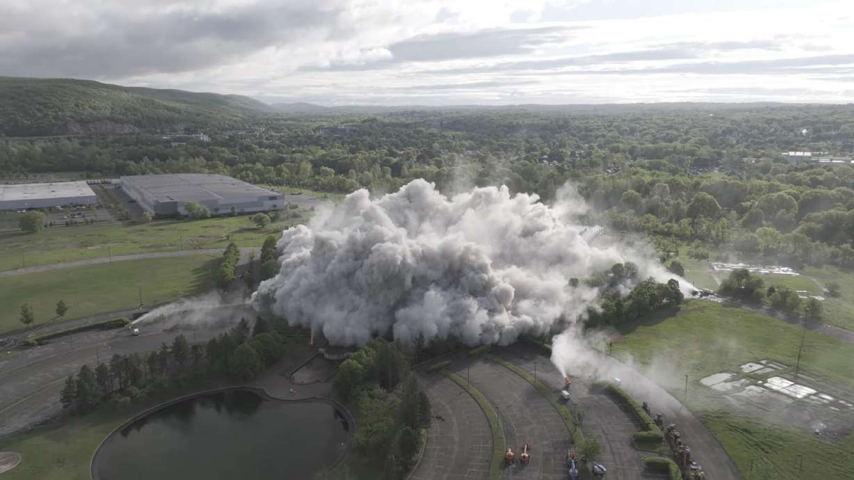 The demolition of the 40-year-old Sheraton Crossroads Hotel was caught on camera and it is oddly satisfying to watch.
