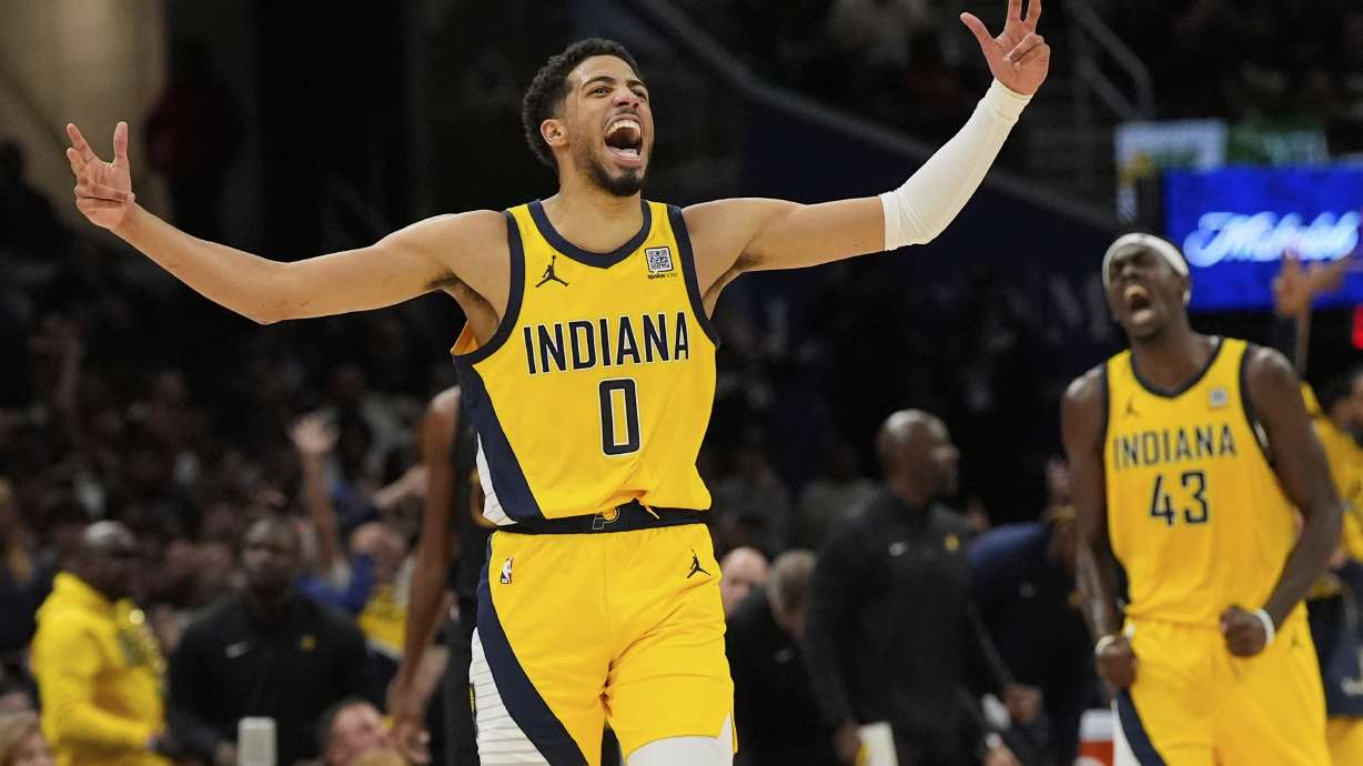 Indiana Pacers guard Tyrese Haliburton, left, celebrates along with forward Pascal Siakam after scoring during the second half in Game 5 of an Eastern Conference semifinal NBA basketball playoff against the Cleveland Cavaliers, Tuesday, May 13, 2025, in Cleveland.