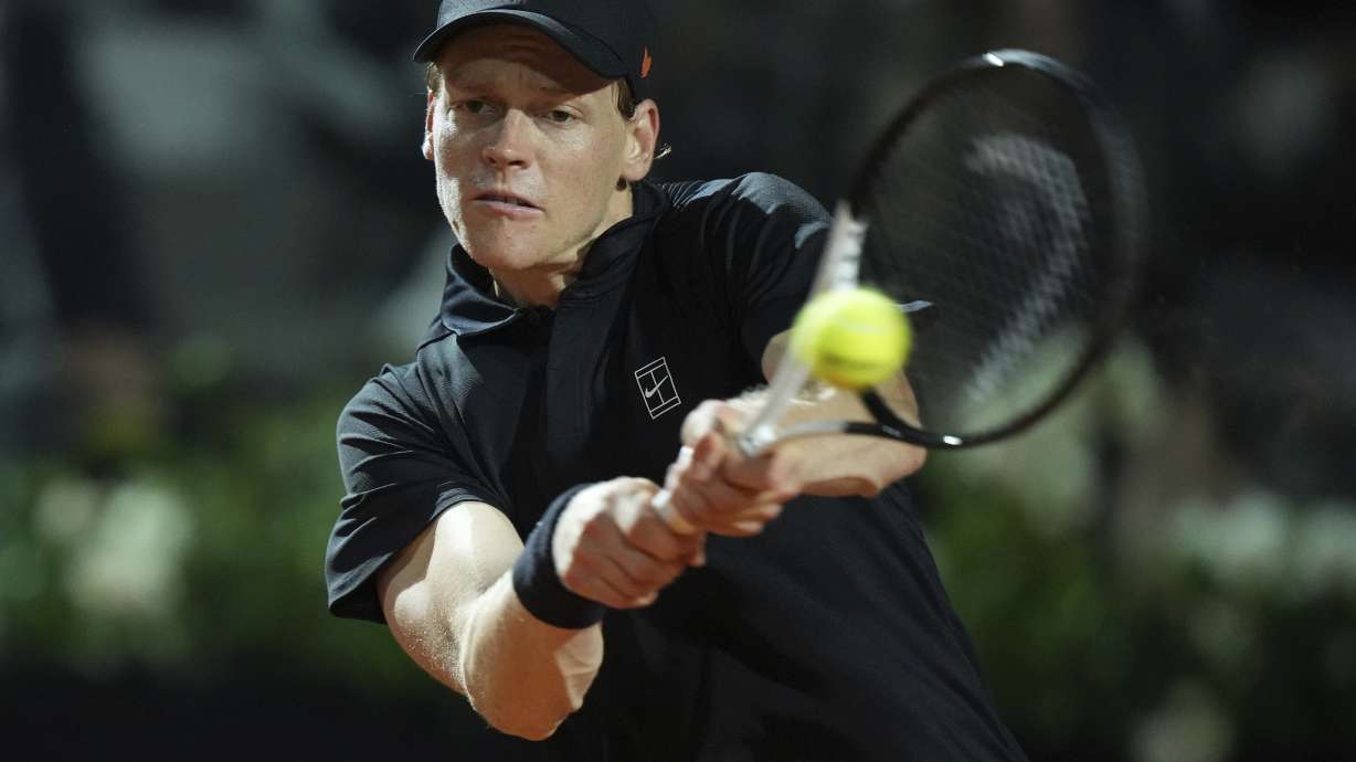 Italy's Jannik Sinner returns a shot during a round of sixteen match against Argentina's Francisco Cerundolo at the Italian Open tennis tournament in Rome, Tuesday, May 13, 2025.
