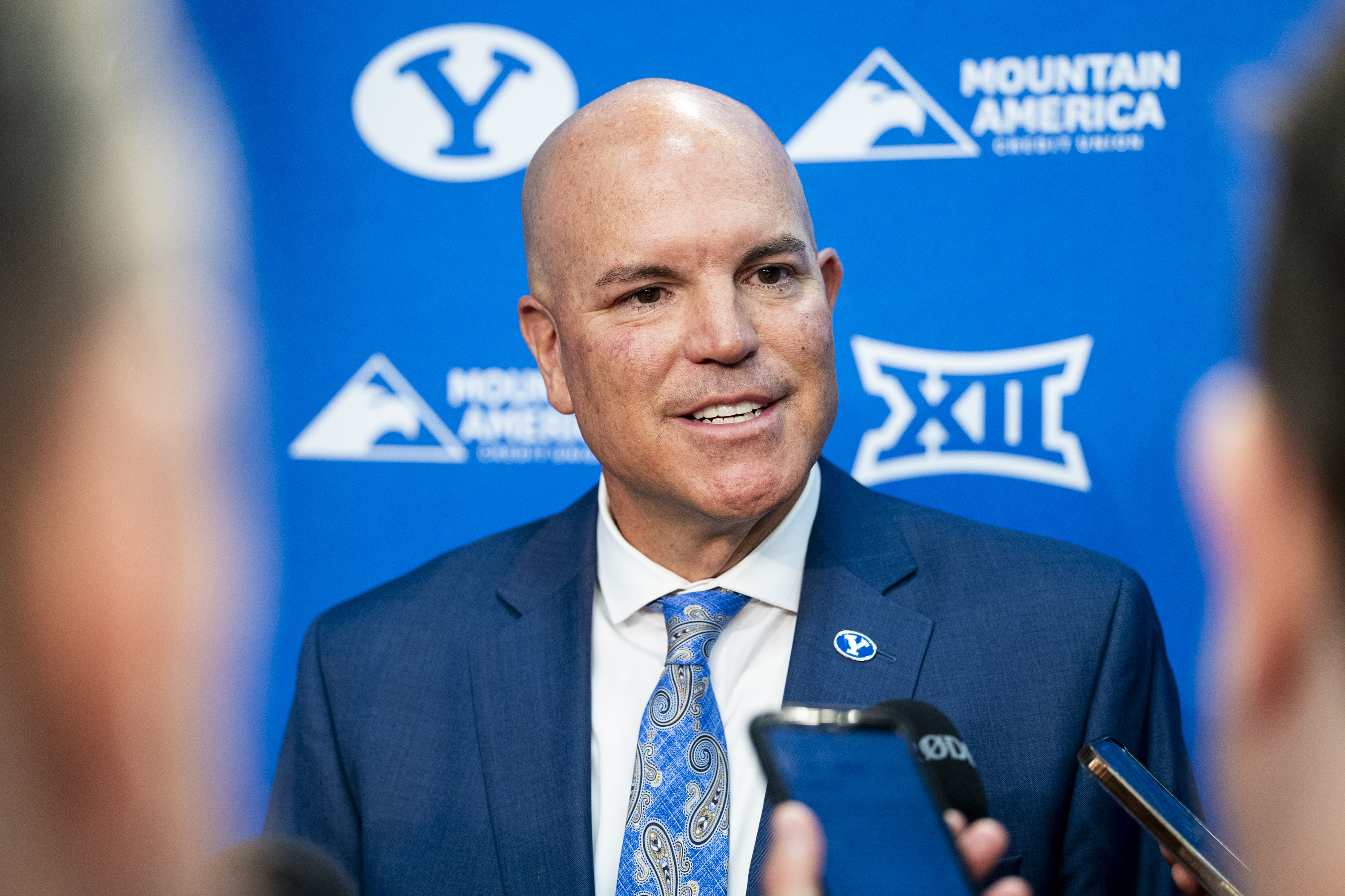 Newly-named Brigham Young University Director of Athletics Brian Santiago takes questions from members of the media after a press conference announcing his hiring for the position held at the BYU Broadcast Building on the university’s campus in Provo on Wednesday, May 14, 2025. Santiago began working at BYU in 1997 and has served as deputy athletic director since 2017.