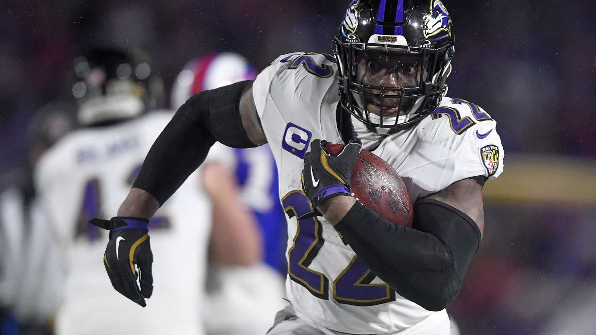 FILE - Baltimore Ravens running back Derrick Henry carries the ball during the third quarter of an NFL divisional playoff football game against the Buffalo Bills, Jan. 19, 2025, in Orchard Park, N.Y.