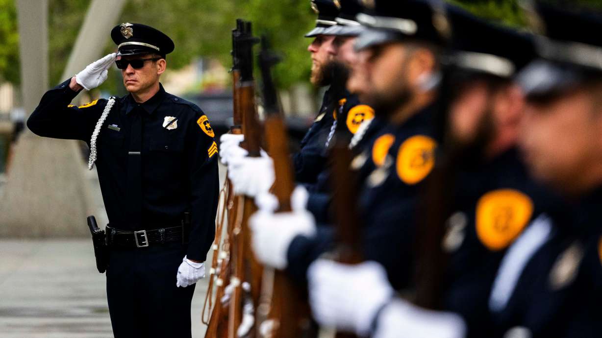 Salt Lake City SWAT members stand at a ceremony to honor the lives of the 25 police officers who have died in the line of duty throughout the Salt Lake City Police Department’s history, in Salt Lake City on Wednesday.