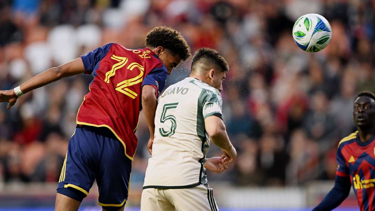 Real Salt Lake forward Zavier Gozo (72) gets off a header around Portland Timbers defender Claudio Bravo (5) toward the goal as they play at America First Field in Sandy on Wednesday, May 14, 2025.