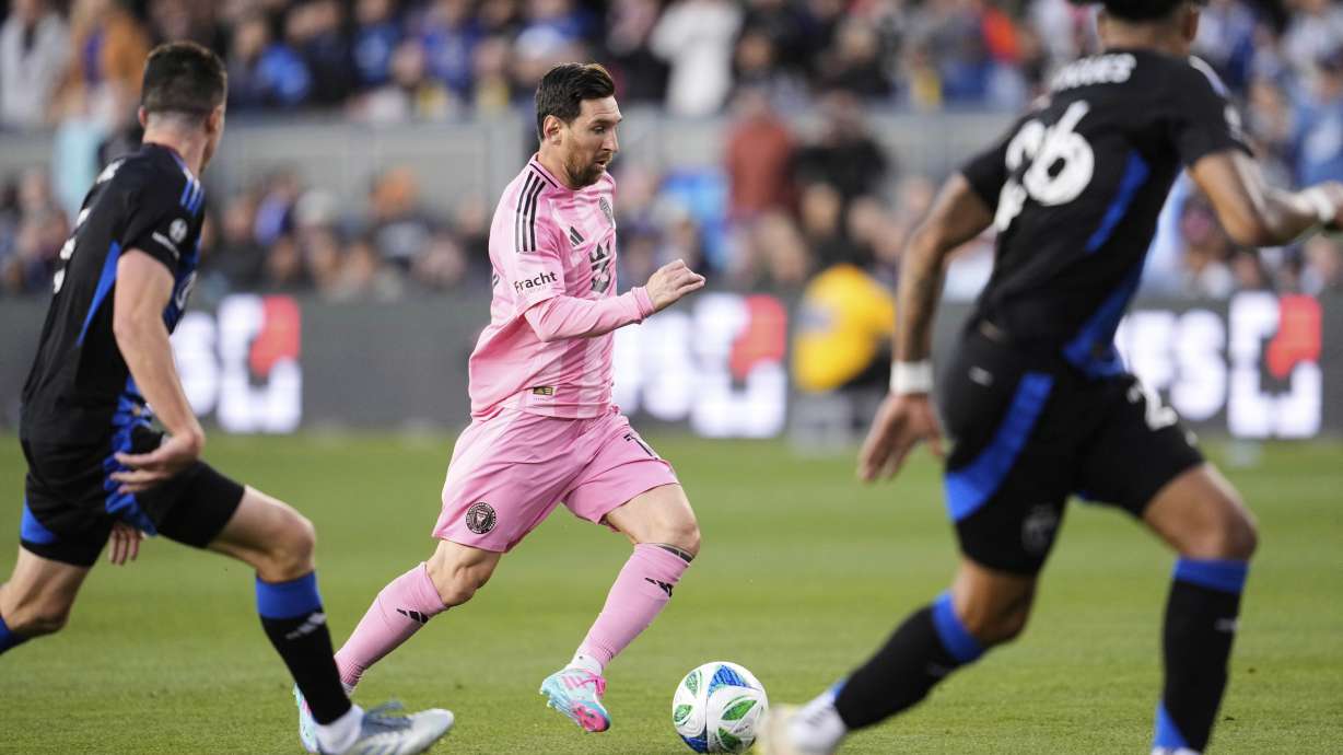 Inter Miami midfielder Lionel Messi, center, moves the ball during the first half of an MLS soccer match against the San Jose Earthquakes, Wednesday, May 14, 2025, in San Jose, Calif.