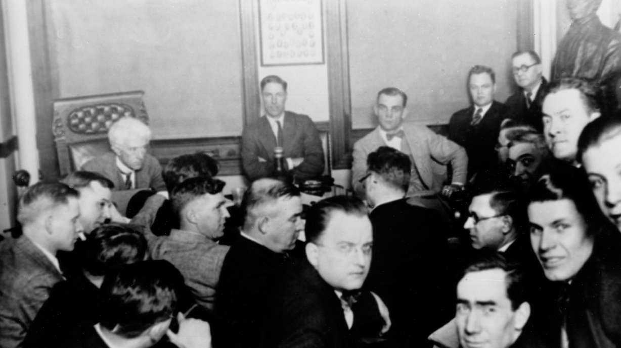FILE - This 1921 file photo shows Judge Kenesaw Mountain Landis, rear left, as Chicago White Sox players, Charles "Swede" Risberg, center left, and Arnold "Chick" Gandil, look on during the investigation of the infamous "Black Sox" scandal in Chicago.