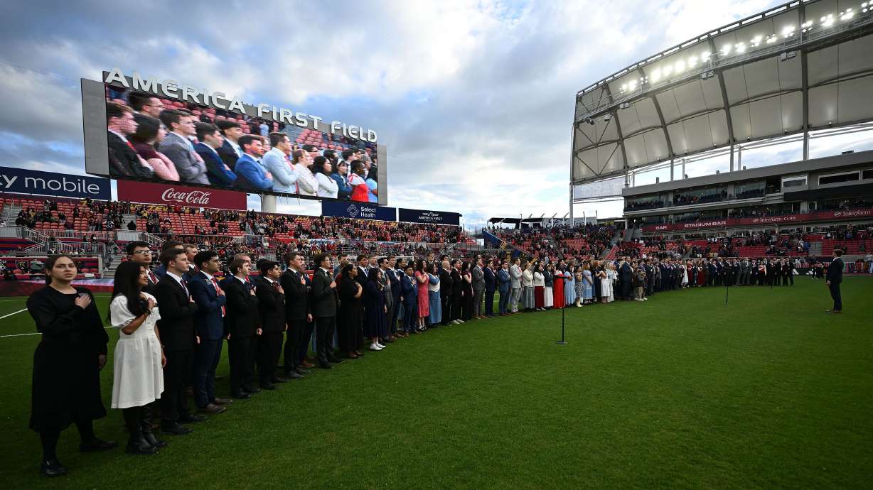 Missionaries from The Church of Jesus Christ of Latter-day Saints sing the national anthem prior to Real Salt Lake and the Portland Timbers playing at America First Field in Sandy on Wednesday.