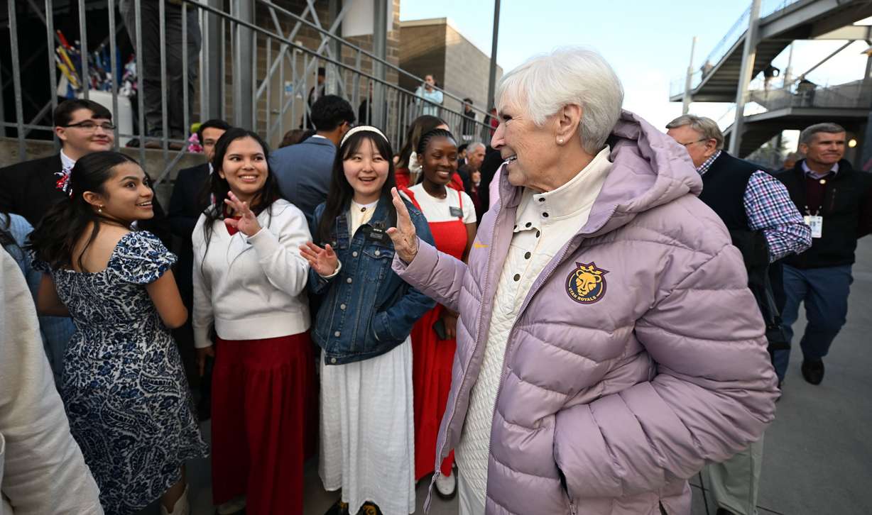 Real Salt Lake soccer’s owner Gail Miller waves to missionaries from The Church of Jesus Christ of Latter-day Saints as she arrives for the game between Real Salt Lake and the Portland Timbers at America First Field in Sandy on Wednesday. The missionaries sang the national anthem ahead of the game.