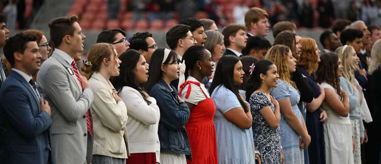 Missionaries from The Church of Jesus Christ of Latter-day Saints sing the national anthem prior to Real Salt Lake and the Portland Timbers playing at America First Field in Sandy on Wednesday.
