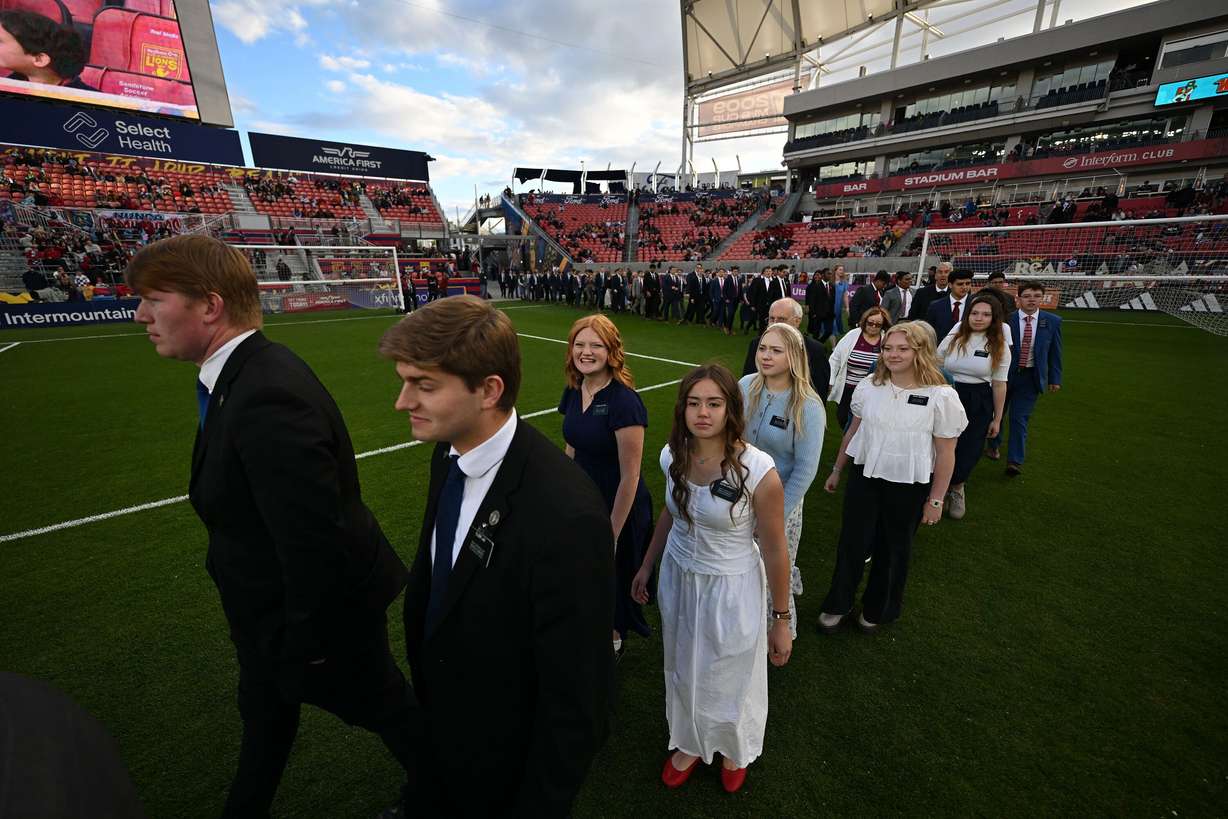 Missionaries from The Church of Jesus Christ of Latter-day Saints walk onto the field to sing the national anthem prior to Real Salt Lake and the Portland Timbers playing at America First Field in Sandy on Wednesday.