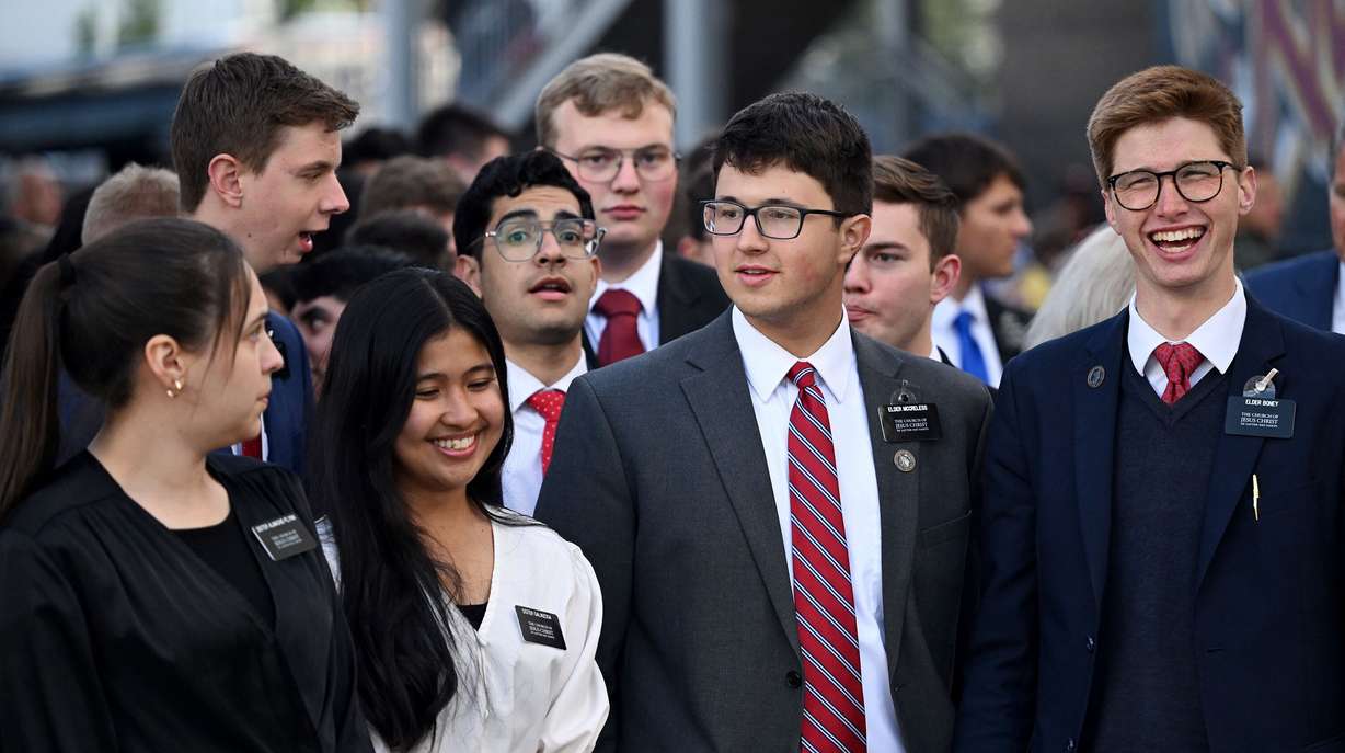 Missionaries from The Church of Jesus Christ of Latter-day Saints wait to walk onto the field to sing the national anthem prior to Real Salt Lake and the Portland Timbers playing at America First Field in Sandy on Wednesday.