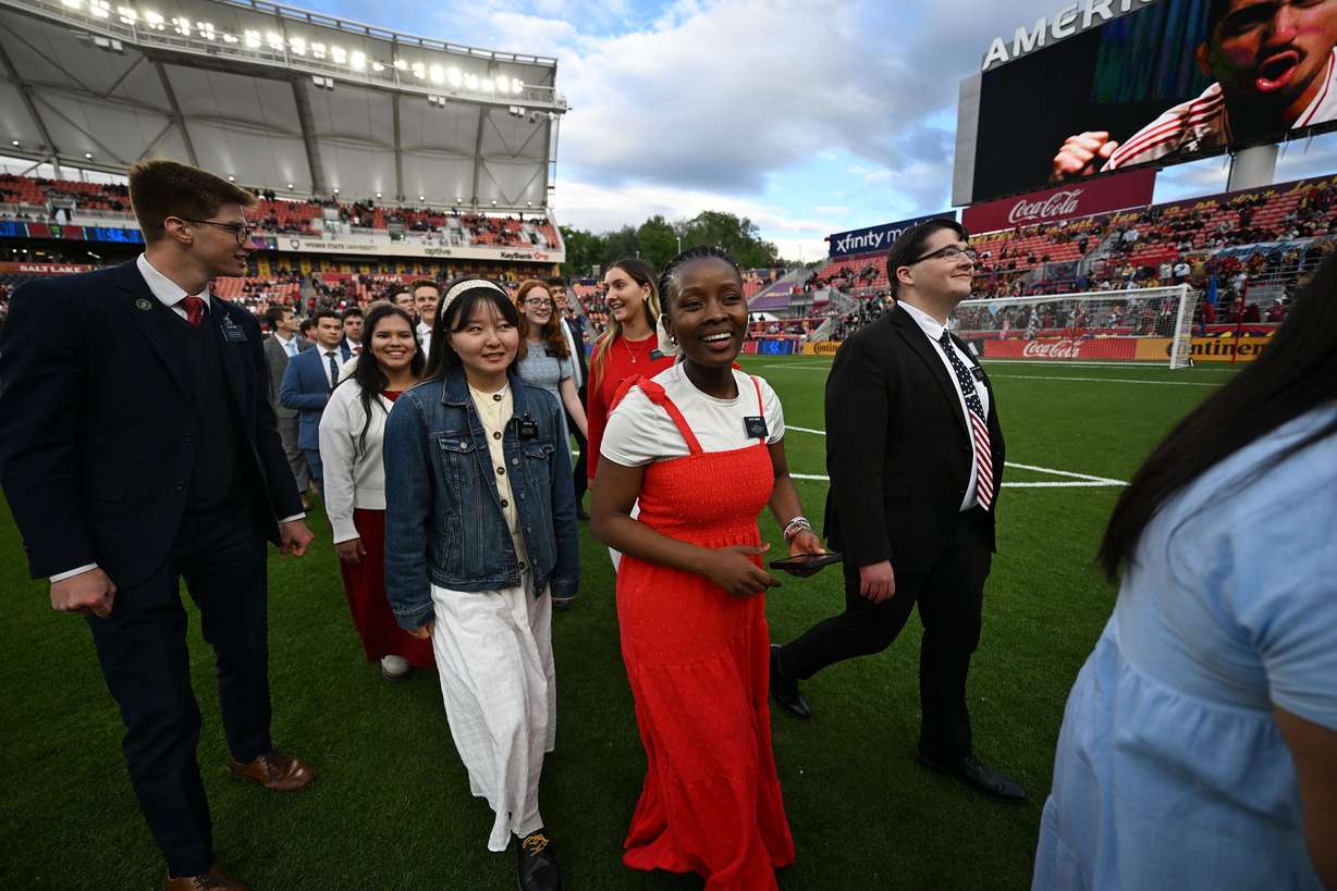 Missionaries from The Church of Jesus Christ of Latter-day Saints exit the field after singing the national anthem prior to Real Salt Lake and the Portland Timbers playing at America First Field in Sandy on Wednesday.