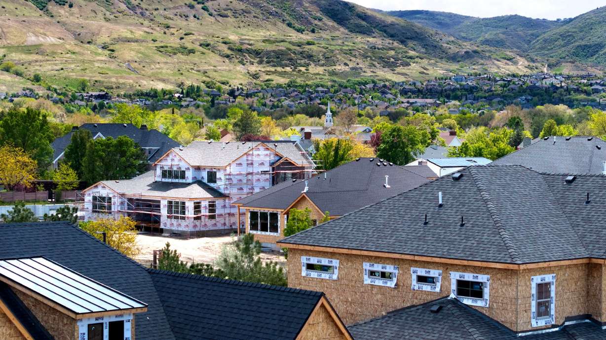 Homes under construction are pictured in Draper on May 1. Mortgage rates were up slightly this week but stayed below 7% for a 17th consecutive week.