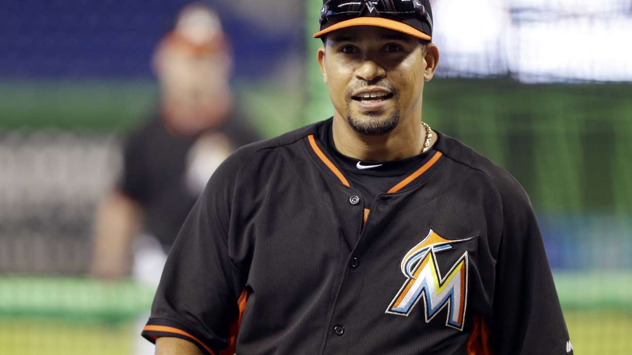 FILE - In this Wednesday, April 30, 2014 file photo, Miami Marlins infielder Rafael Furcal (15) smiles during batting practice before a baseball game against the against the Atlanta Braves in Miami.