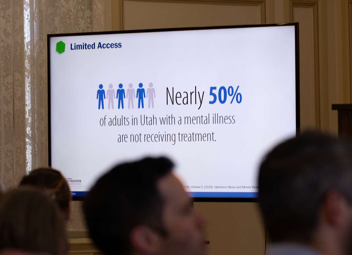 Information about mental health treatment is on display at the Gardner Institute’s Newsmaker Breakfast on the Utah Behavioral Health Master Plan at the Thomas S. Monson Center in Salt Lake City on Thursday.