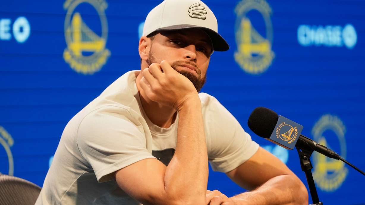 Golden State Warriors guard Stephen Curry listens during a news conference at the NBA basketball team's facility in San Francisco, Thursday, May 15, 2025.