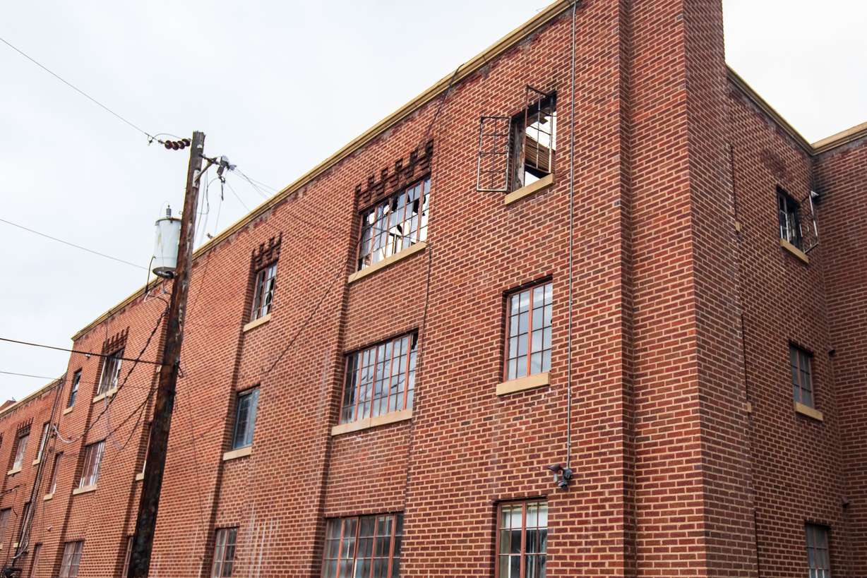 Fire damage to Chateau Normandie is visible on Tuesday. Fires on Oct. 31 and Nov. 1, 2024, severely damaged the historic apartment complex.