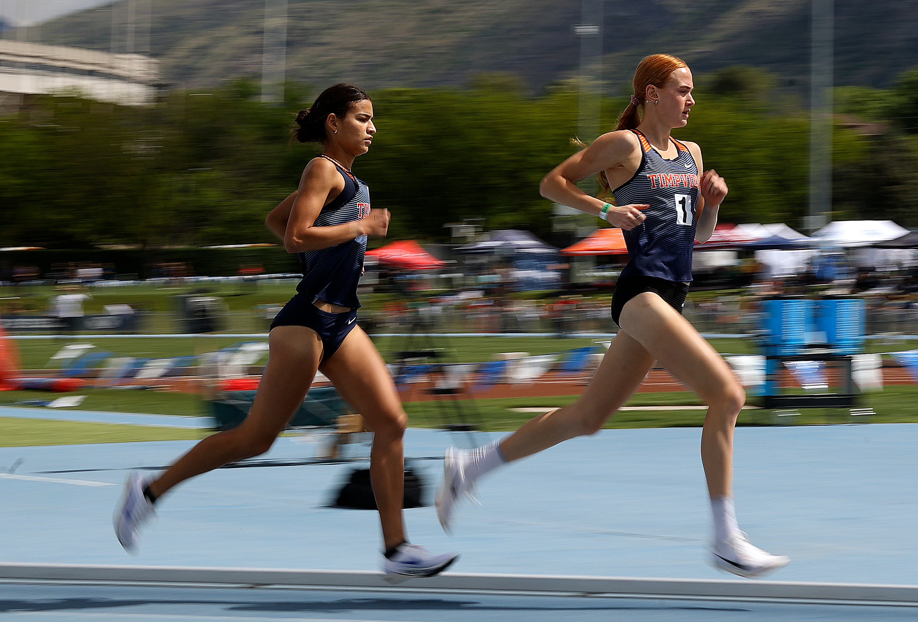 Timpview’s Lily Alder and Jane Hedengren compete in the girls 3200m run during the 5A high school state track meet at the Clarence F. Robison Outdoor Track and Field in Provo on Thursday, May 15, 2025. Hedengren won and Alder placed second.