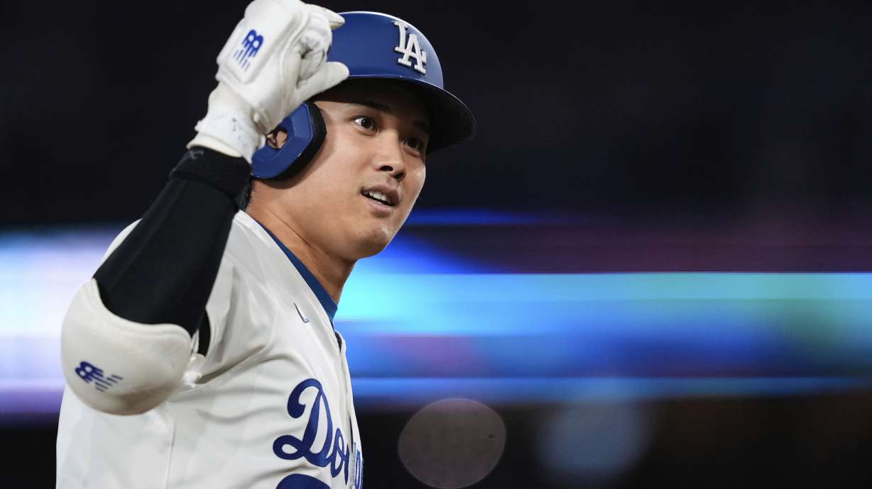 Los Angeles Dodgers' Shohei Ohtani celebrates after hitting a three-run home run during the third inning of a baseball game against the Athletics, Thursday, May 15, 2025, in Los Angeles.