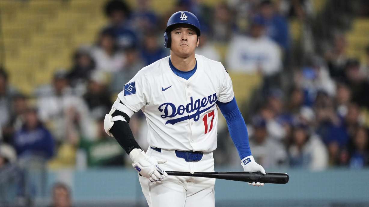 Los Angeles Dodgers' Shohei Ohtani reacts after striking out during the eighth inning of a baseball game against the Athletics, Thursday, May 15, 2025, in Los Angeles.