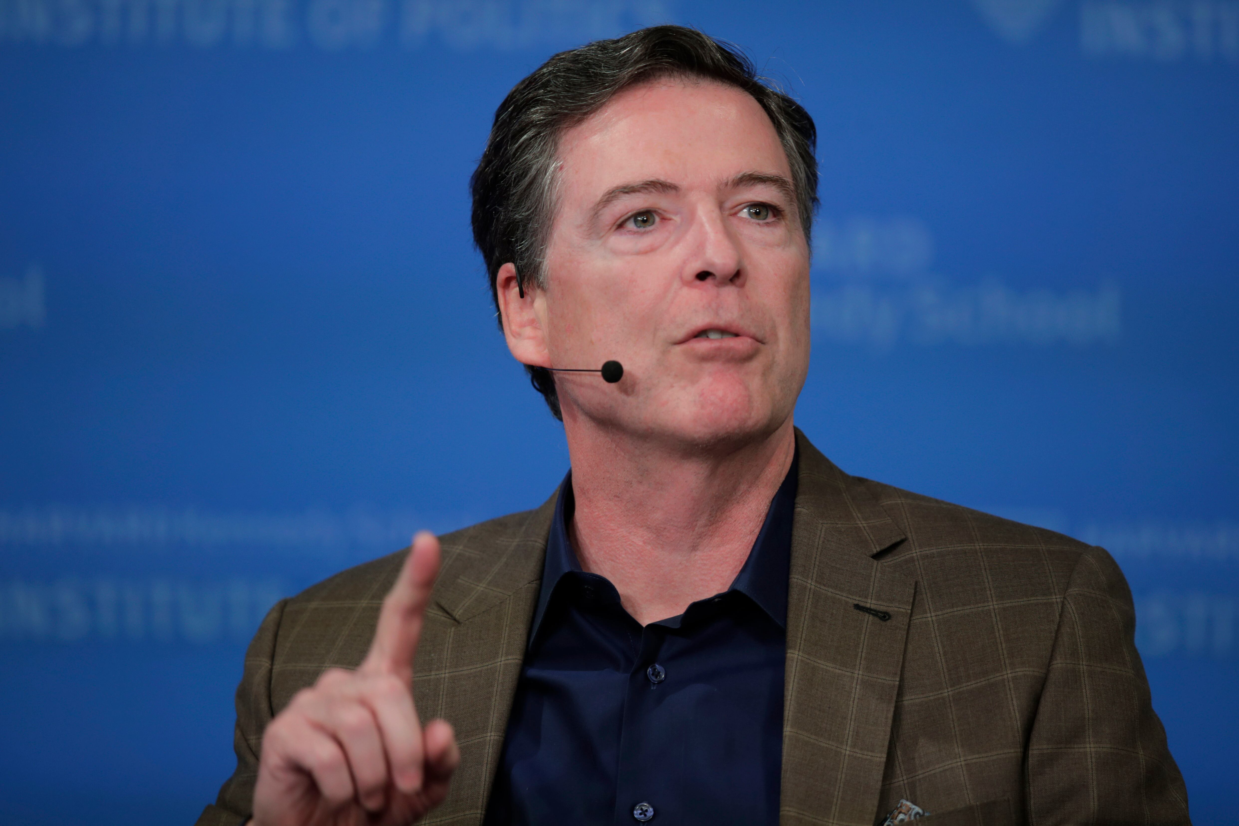 Former FBI director James Comey speaks at Harvard University on Feb. 24, 2020. Comey is under investigation after a social media post with a cryptic message allegedly calling for President Donald Trump's assassination or removal.