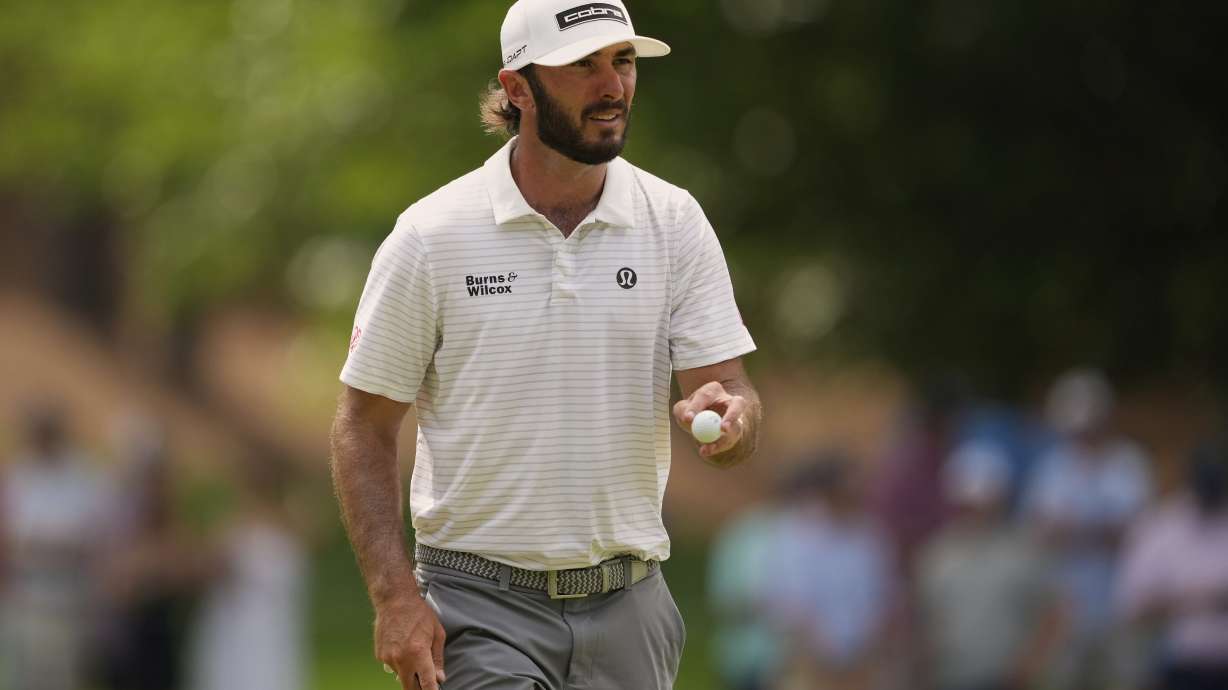 Max Homa waves after making a putt on the sixth hole during the second round of the PGA Championship golf tournament at the Quail Hollow Club, Friday, May 16, 2025, in Charlotte, N.C.