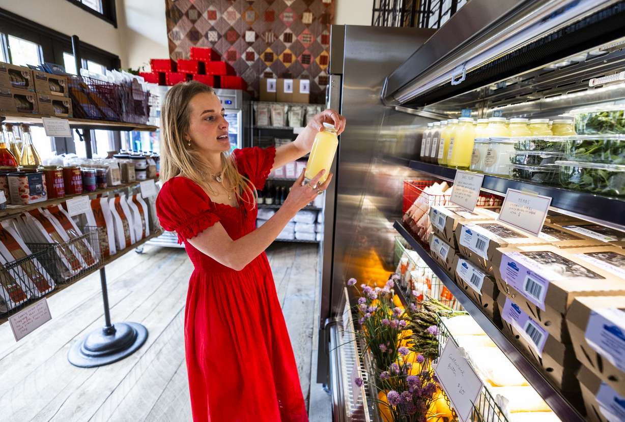 Ballerina Farm owner Hannah Neeleman talks about products for sale at the farm store during a media day for Ballerina Farm’s new farm store in Midway on Friday.