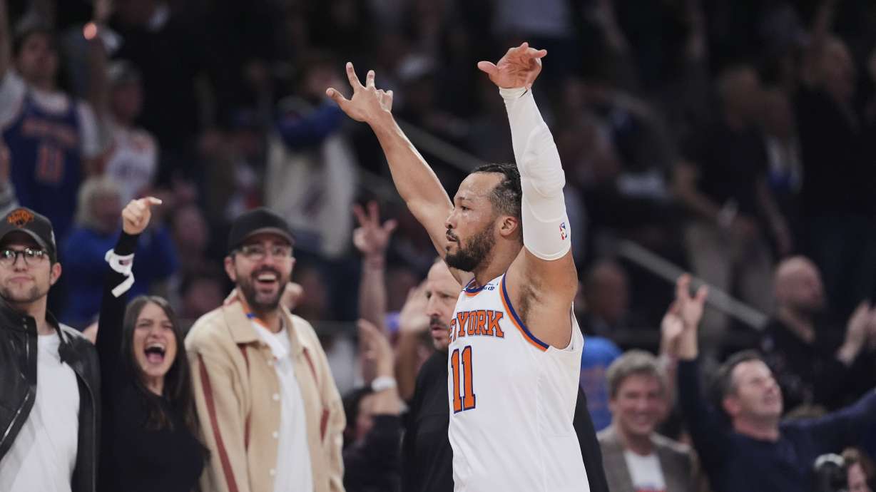 New York Knicks' Jalen Brunson (11) gestures to fans during the second half of Game 6 in the Eastern Conference semifinals of the NBA basketball playoffs against the Boston Celtics Friday, May 16, 2025, in New York.