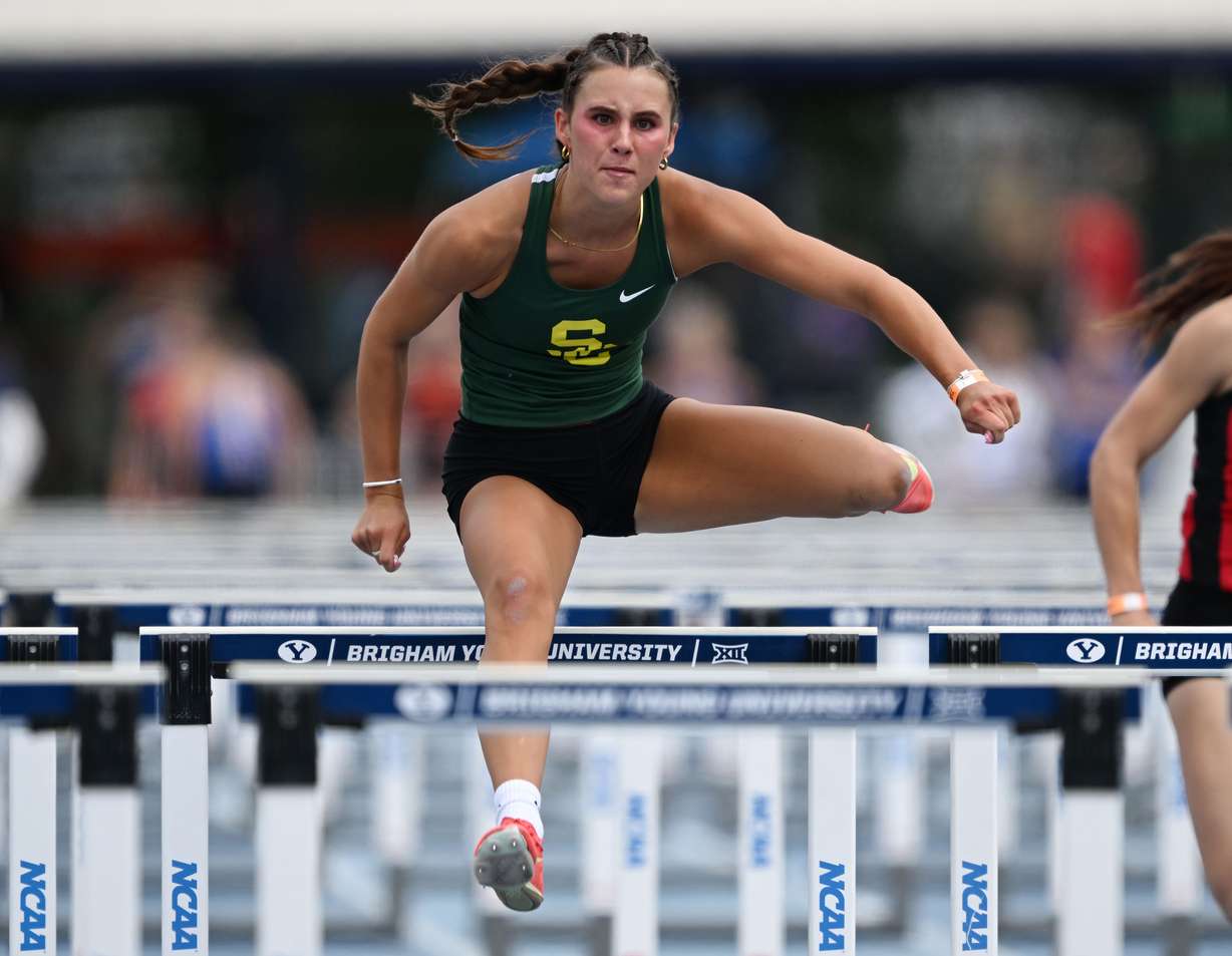 Tia Brown of Snow Canyon High School competes in the 100m hurdles during Day 1 of state track for 4A, 3A, 2A and 1A at BYU in Provo on Friday, May 16, 2025.