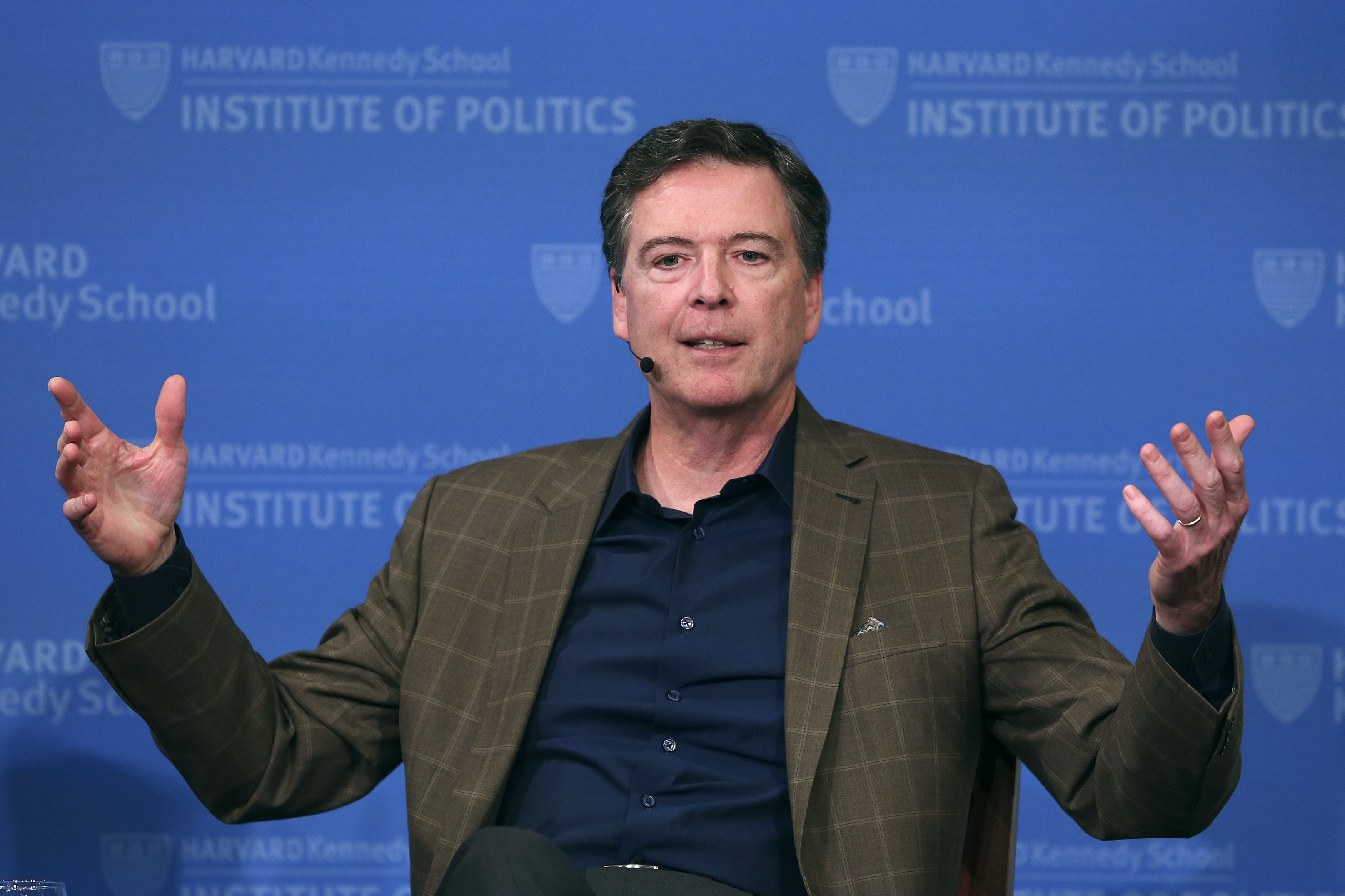 Former FBI Director James Comey gestures speaks at Harvard University in Cambridge, Massachusetts, Feb. 24, 2020. Utah Sen. Mike Lee introduced a resolution condemning Comey for a post Lee said called for the assassination of the president.