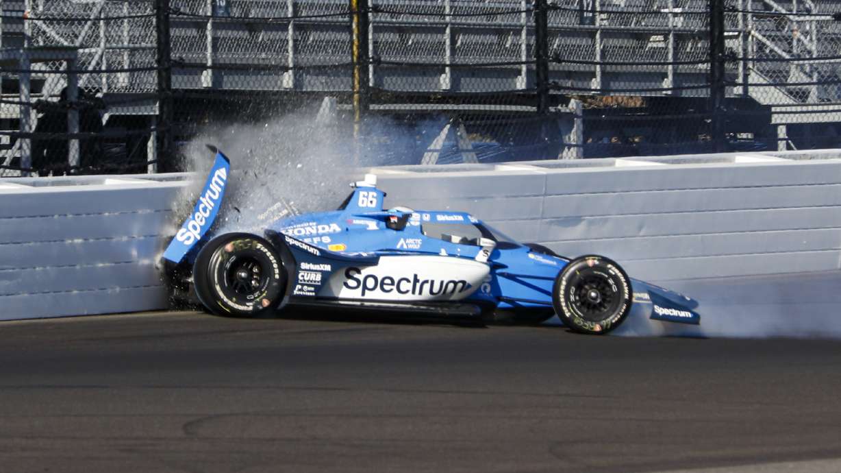 Marcus Armstrong, of New Zealand, hits the wall in the first turn during practice for the Indianapolis 500 auto race at Indianapolis Motor Speedway in Indianapolis, Saturday, May 17, 2025.