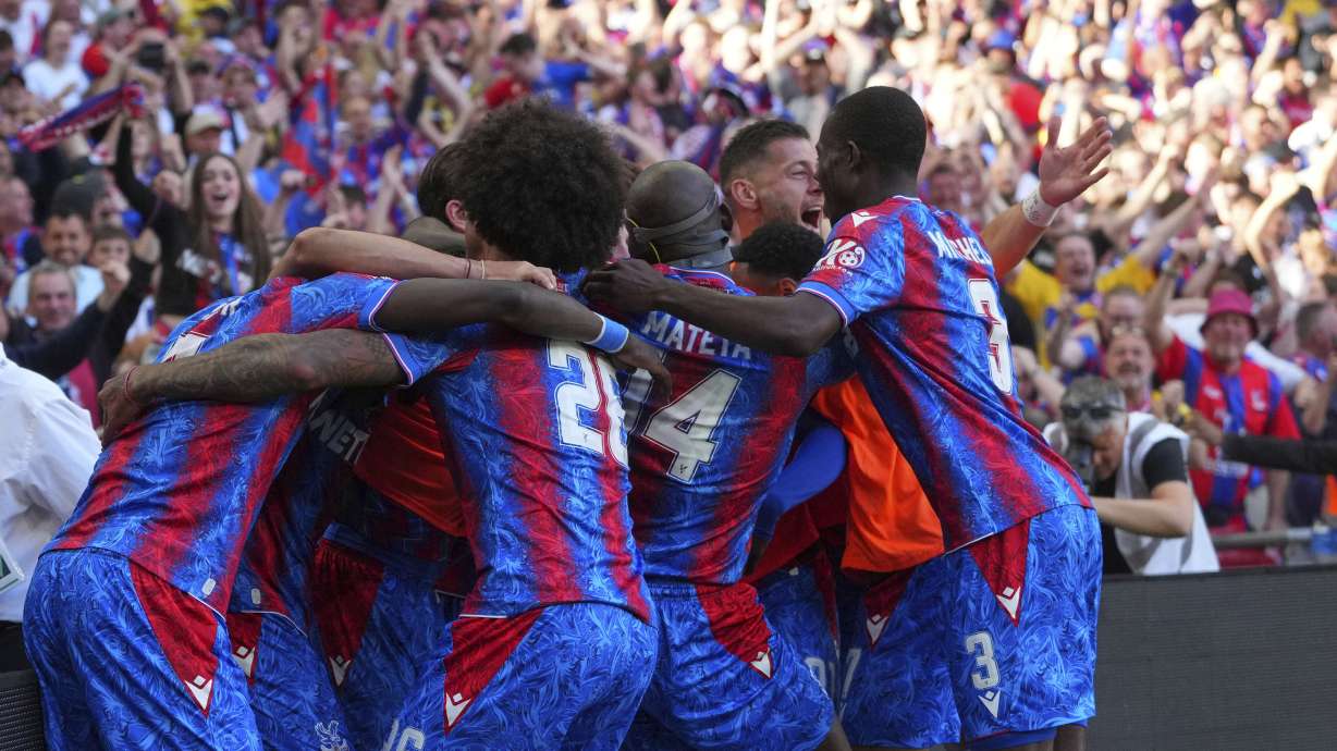 Crystal Palace players celebrate a goal that was later disallowed by a VAR decision during the English FA Cup final soccer match between Crystal Palace and Manchester City at Wembley stadium in London, Saturday, May 17, 2025.