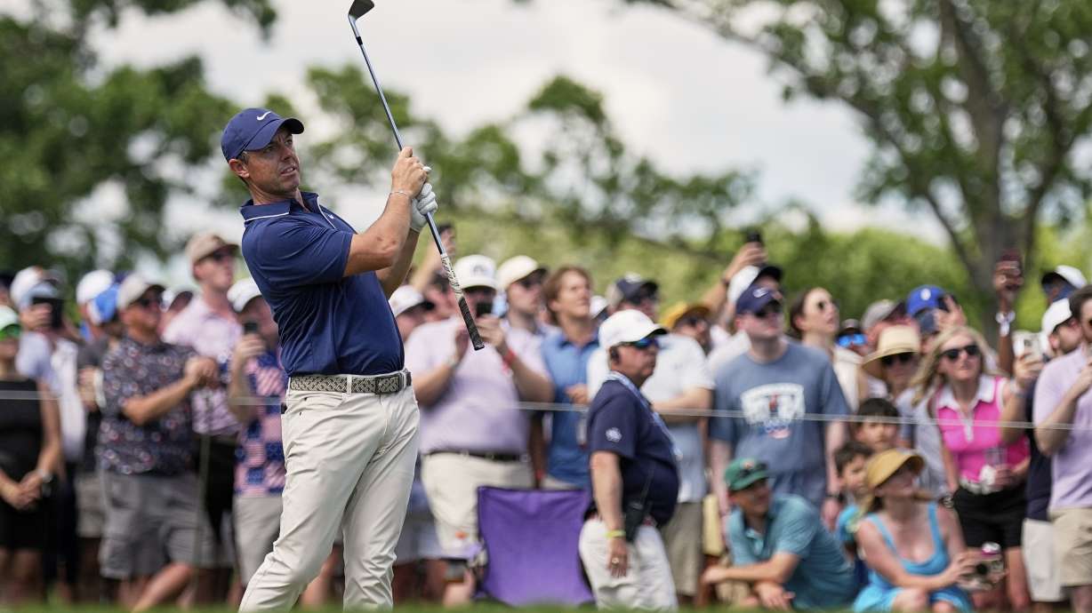 Rory McIlroy, of Northern Ireland, watches his tee shot on the 17th hole during the third round of the PGA Championship golf tournament at the Quail Hollow Club, Saturday, May 17, 2025, in Charlotte, N.C.