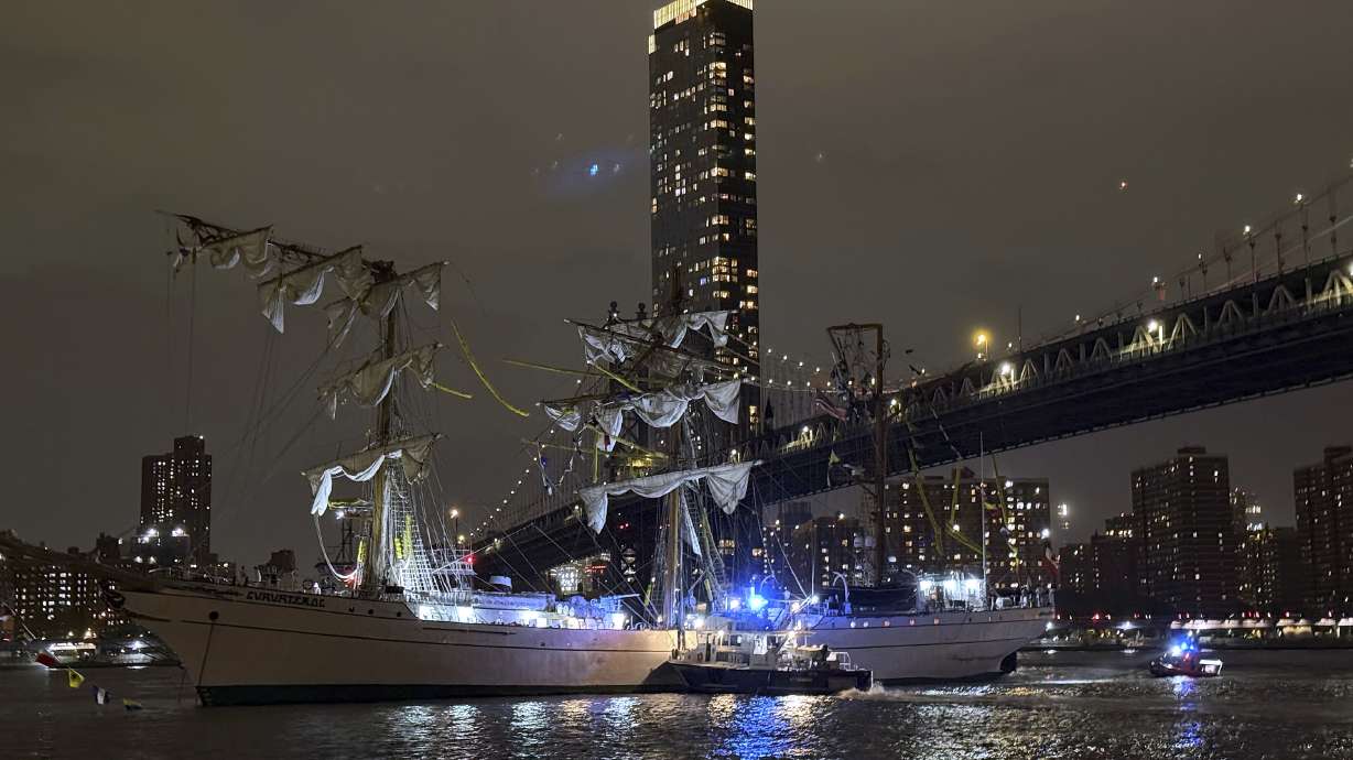A masted Mexican Navy training ship, the Cuauhtémoc, sits stranded after colliding with the Brooklyn Bridge Saturday.
